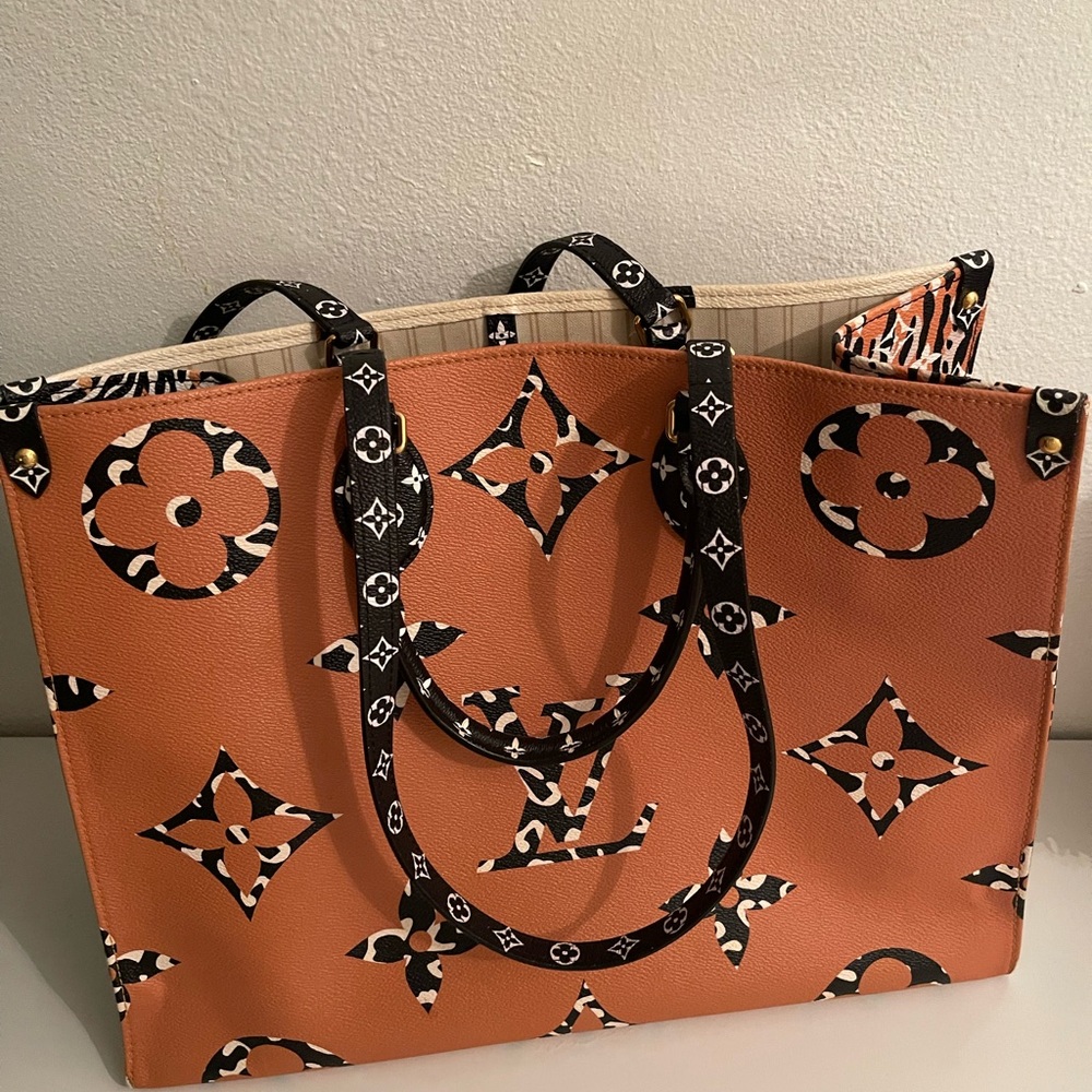 Authentic Louis Vuitton On The Go Jungle Monogram Tote Bag